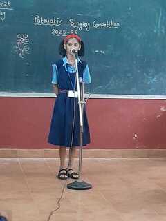 Patriotic singing students of Std III  IV